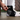 Tightening the upper velcro straps of the Vero Ankle® Brace